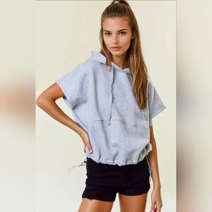 Drawstring Bottom Sleeveless Crop Length Hoodie